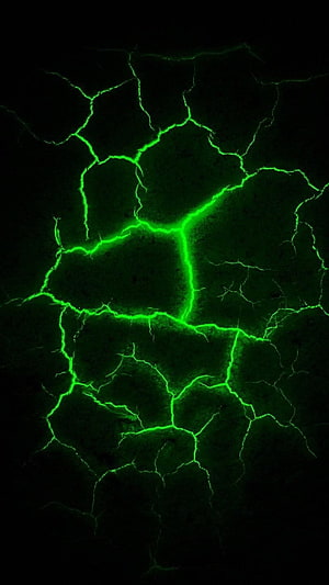 Glowing Green Fracture Pattern on Dark Surface with Neon Energy Veins HD phone wallpaper