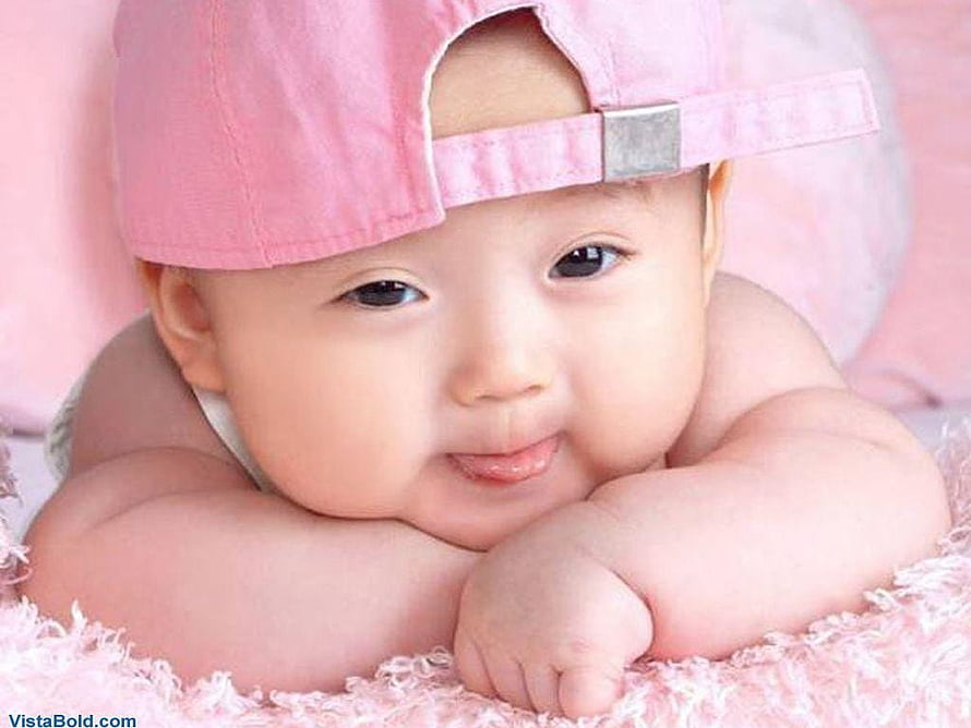 Cute Baby Girl Wearing Pink Baseball Cap Lying on Soft Blanket HD wallpaper