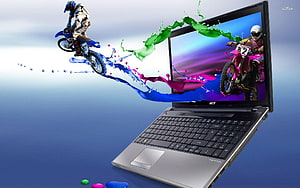 Acer Aspire Laptop with Dirt Bike Riders Emerging from Screen in Colorful Liquid Splash HD wallpaper