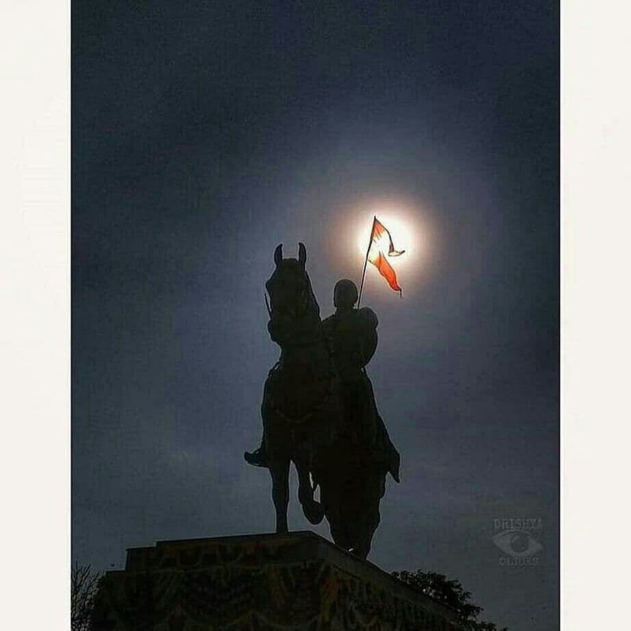 Silhouette of equestrian statue holding flag against bright moon HD phone wallpaper