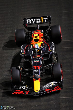 Red Bull Racing Formula 1 Car with BYB T Sponsorship and Number 11 Livery HD phone wallpaper