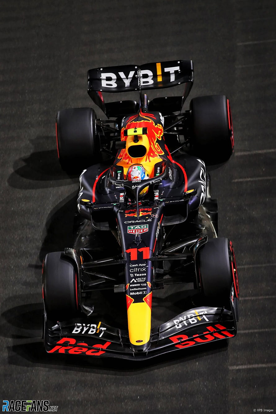 Red Bull Racing Formula 1 Car with BYB T Sponsorship and Number 11 Livery HD phone wallpaper