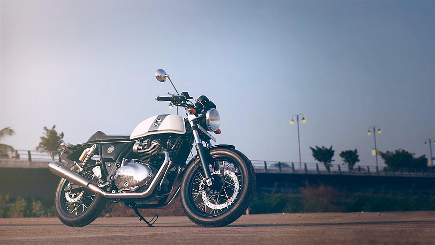 Royal Enfield Continental GT 650 Classic Motorcycle Parked on Open Road at Dusk HD wallpaper
