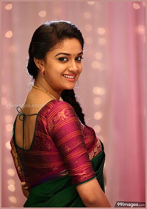 Keerthy Suresh in a Green and Magenta Silk Saree with Gold Jewelry HD phone wallpaper