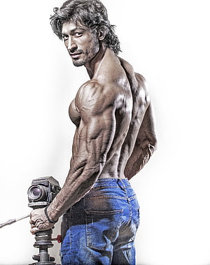 Vidyut Jammwal Muscular Physique Portrait With Vintage Camera HD phone wallpaper
