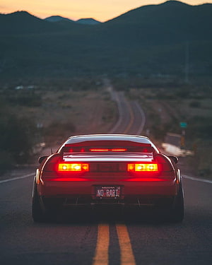 Rear View of a Red Honda NSX Driving on a Desert Highway at Sunset HD phone wallpaper