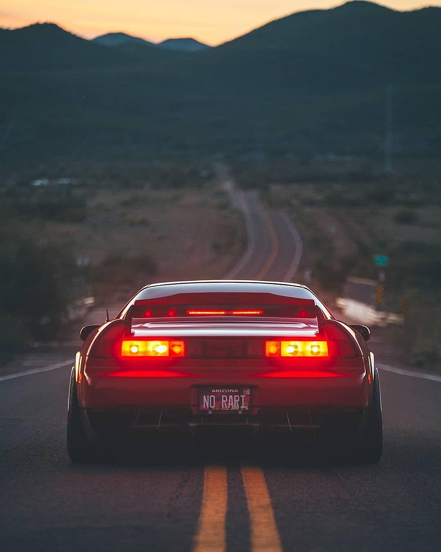 Rear View of a Red Honda NSX Driving on a Desert Highway at Sunset HD phone wallpaper