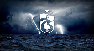 Trabzonspor Club Crest Against Dramatic Stormy Ocean Sky With Lightning HD wallpaper