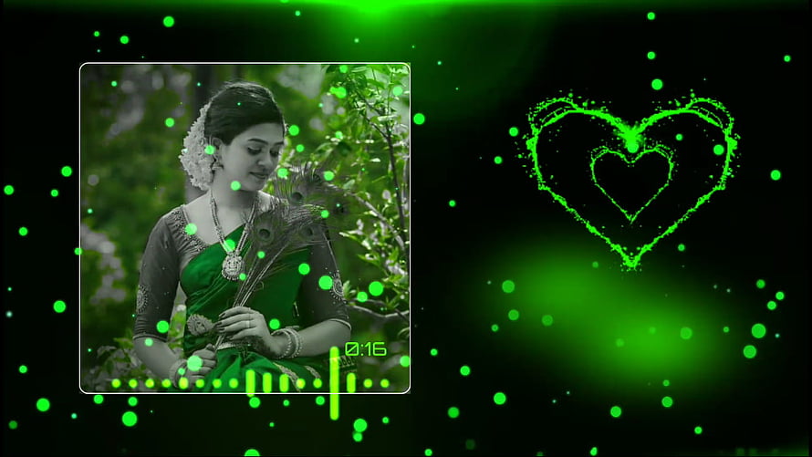 Woman in Green Saree Holding Peacock Feathers with Glowing Heart Background, Avee Player Template 85 HD wallpaper