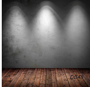 Moody Concrete Wall with Wooden Floor and Dramatic Spotlight Beams HD wallpaper