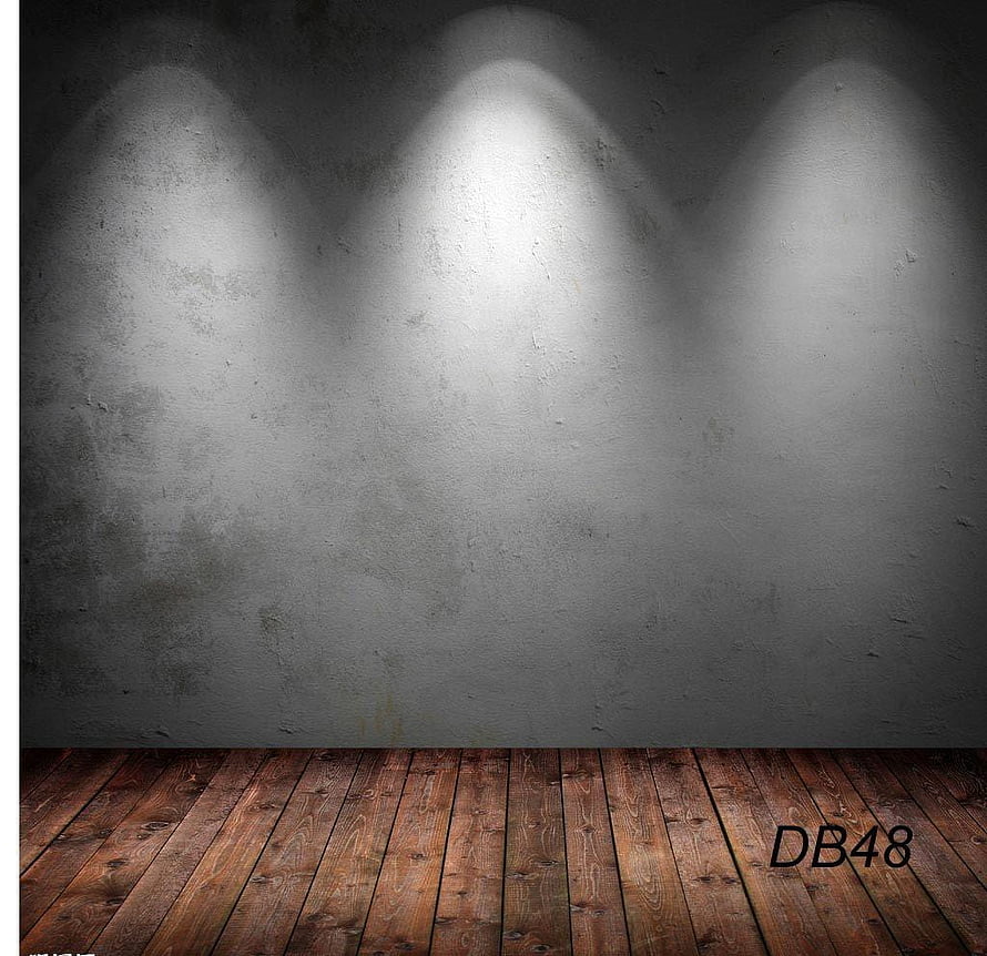 Moody Concrete Wall with Wooden Floor and Dramatic Spotlight Beams HD wallpaper