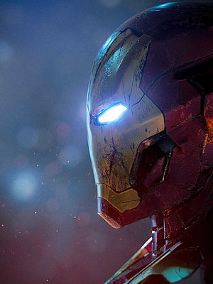 Damaged Iron Man Helmet Close-Up With Glowing Blue Eyes And Battle Scars, iron man 2022, #Iron Man HD phone wallpaper