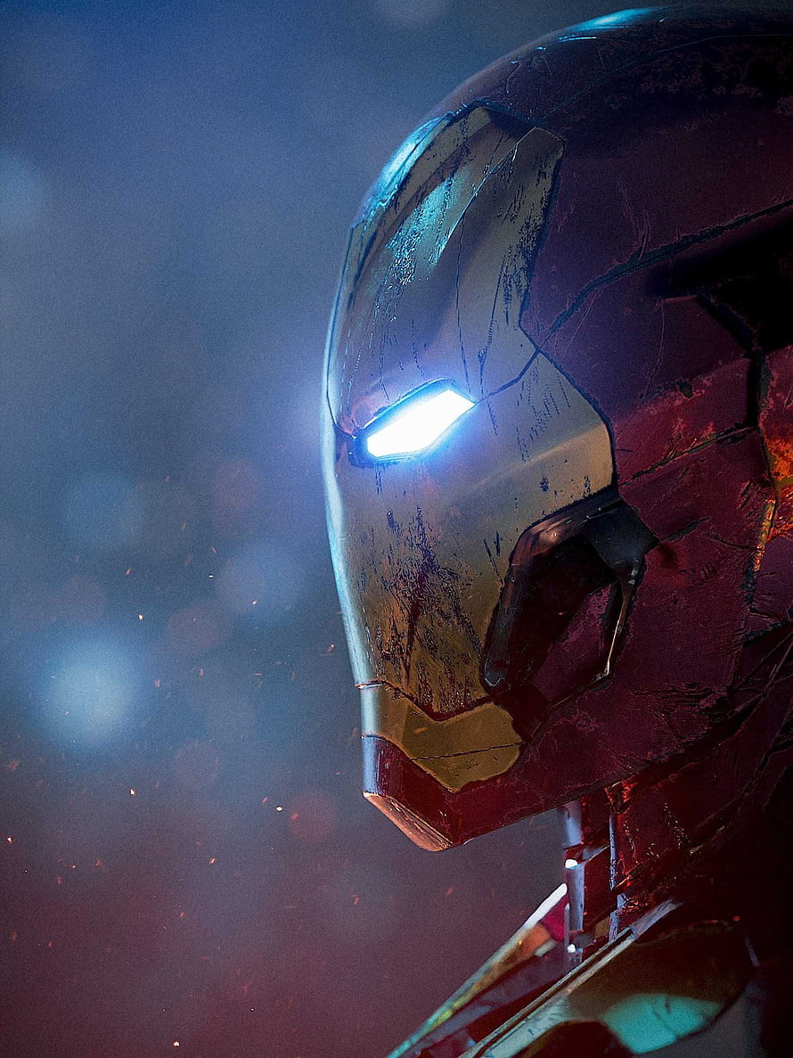 Damaged Iron Man Helmet Close-Up With Glowing Blue Eyes And Battle Scars, iron man 2022, #Iron Man HD phone wallpaper