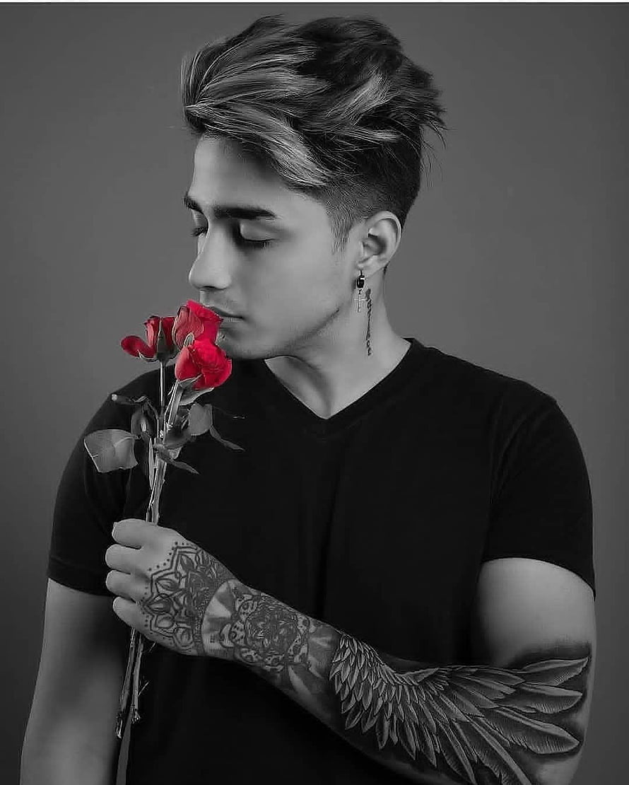 Young man with tattoos holding red roses in black and white portrait, sexandrun Looks Like @danish_zehen, danis jehan graphy HD phone wallpaper