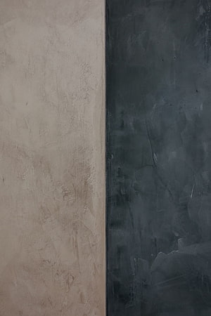 Minimalist Split Color Wall Texture with Beige and Dark Grey Concrete Surfaces HD phone wallpaper