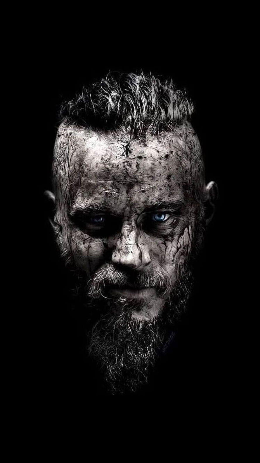 Ragnar Lothbrok Dark Portrait with Intense Blue Eyes and Weathered Beard HD phone wallpaper