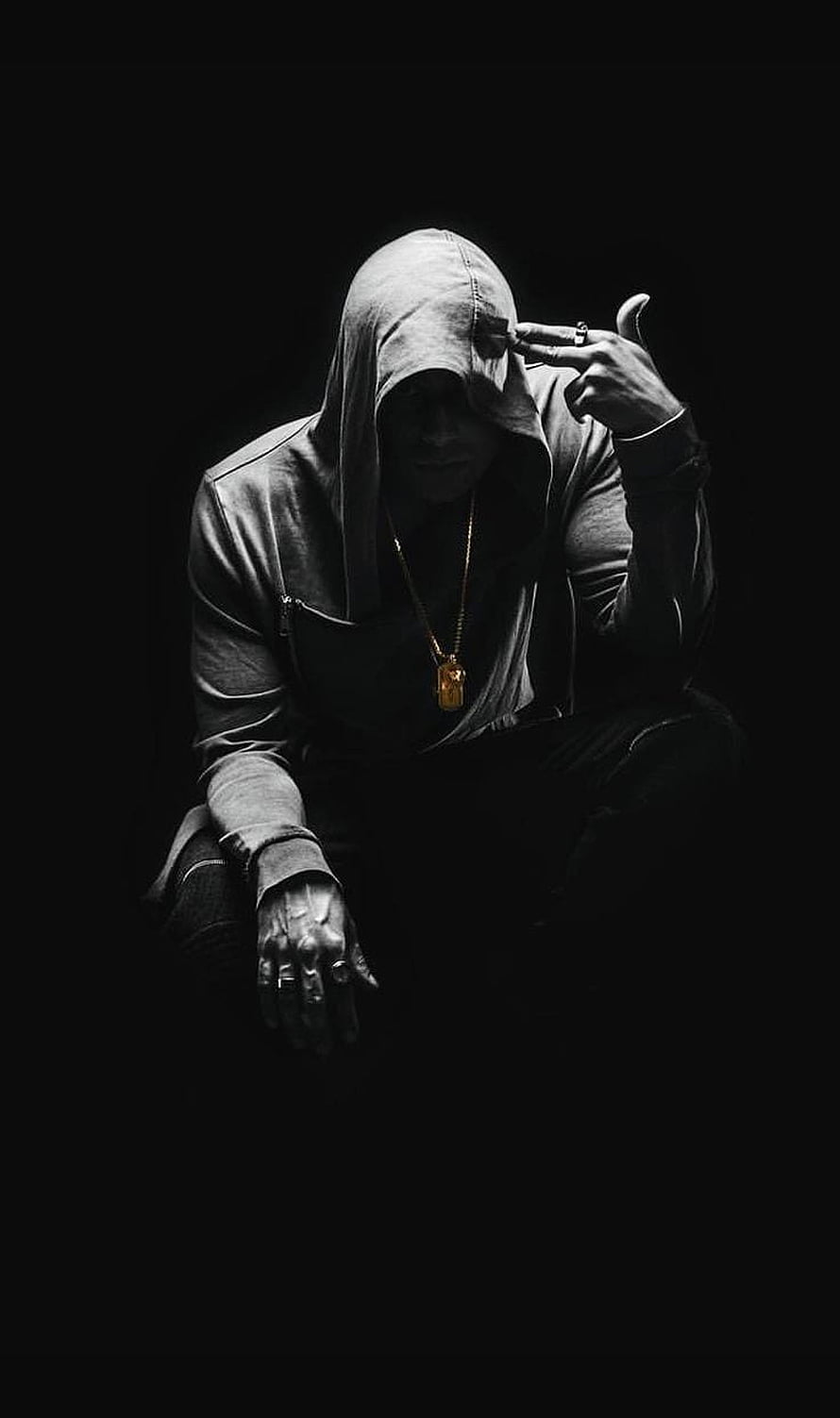 Mysterious hooded figure in dark shadows with gold chain and rings HD phone wallpaper