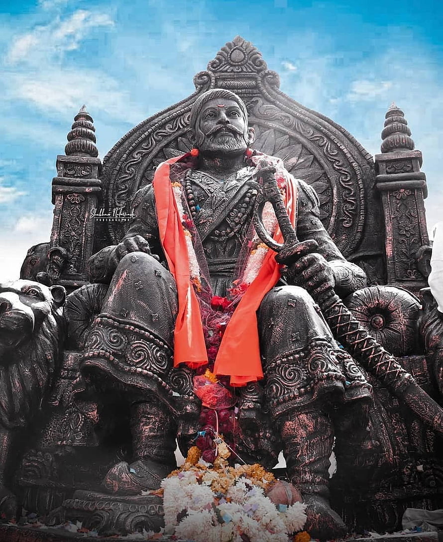 Majestic Statue of Chhatrapati Shivaji Maharaj Seated on Ornate Throne with Sword HD phone wallpaper