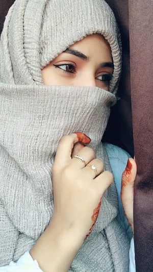 Portrait of a woman wearing a grey knit hijab with henna on her hands, muslim, niqab girl HD phone wallpaper