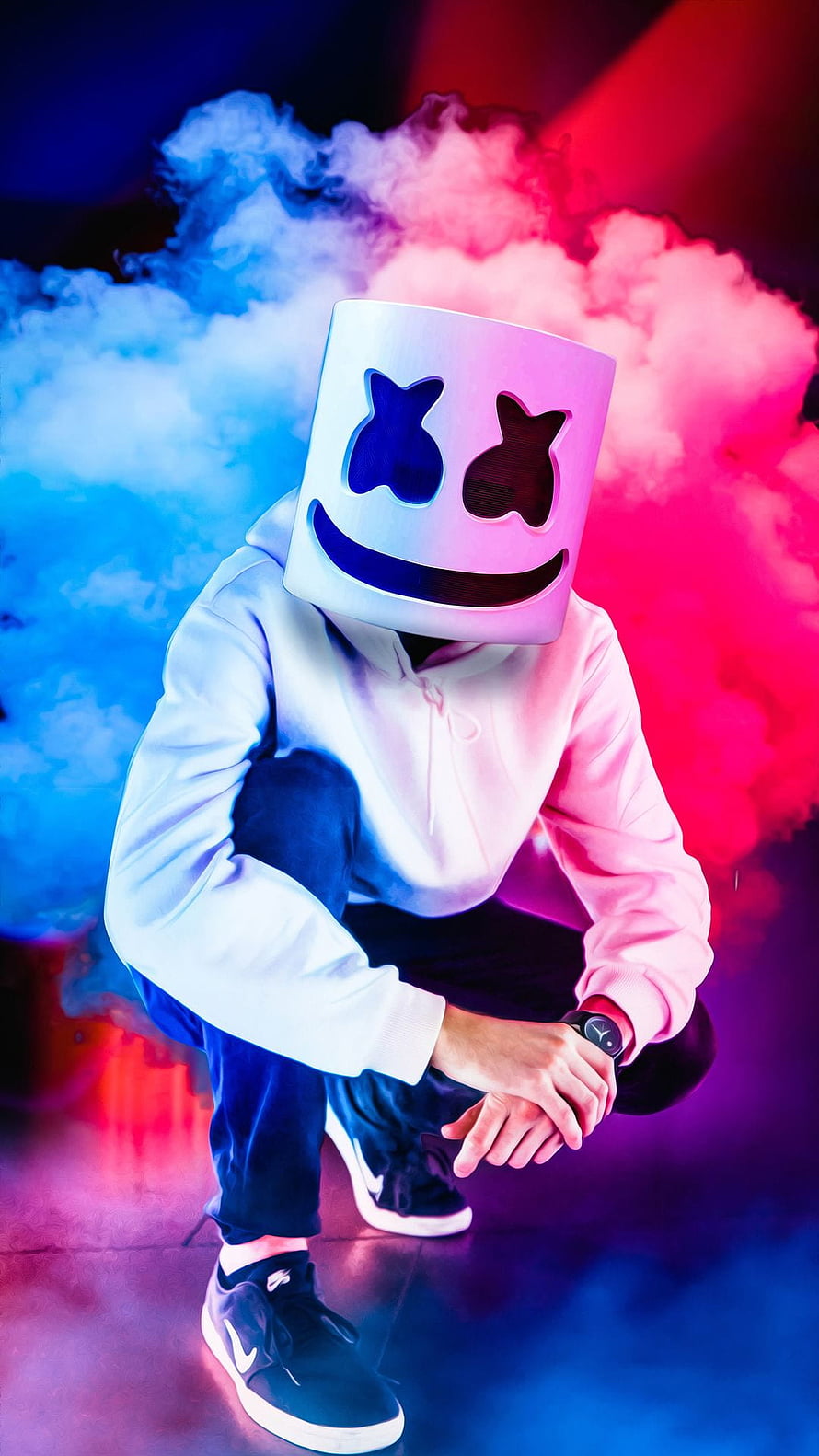 Marshmello DJ in white hoodie crouching with neon blue and pink smoke backdrop HD phone wallpaper