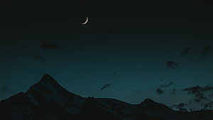 Crescent Moon Over Snow-Capped Mountain Peaks at Night HD wallpaper