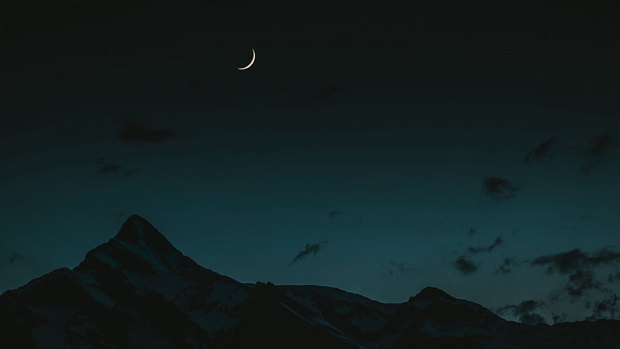 Crescent Moon Over Snow-Capped Mountain Peaks at Night HD wallpaper