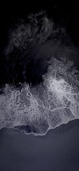 Aerial View of Dark Ocean Waves Crashing on a Black Sand Beach at Night HD phone wallpaper