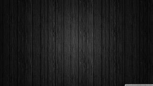 Dark Charcoal Wood Plank Texture with Vertical Grain Pattern HD wallpaper