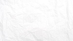 Crumpled White Paper Texture Background with Soft Folds and Subtle Shadows HD wallpaper