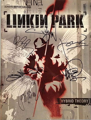 Linkin Park Hybrid Theory Guitar Tab Book Cover with Autographs and Angelic Figure HD phone wallpaper