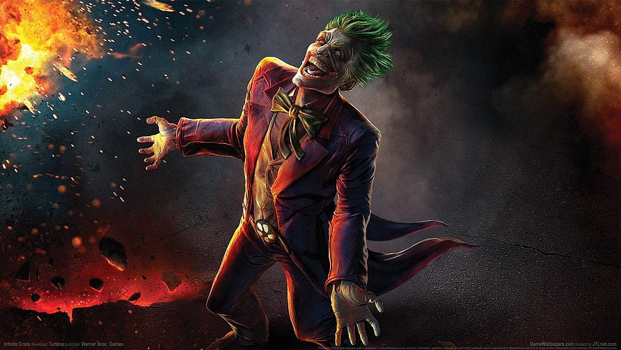 Joker in a Purple Suit Laughing Maniacally Amidst Fire and Debris HD wallpaper