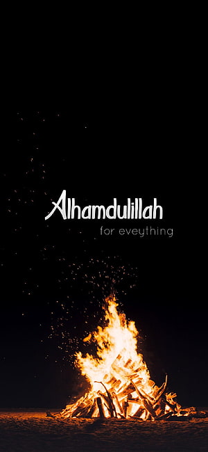 Bonfire at Night with Sparks and Alhamdulillah Text Overlay HD phone wallpaper