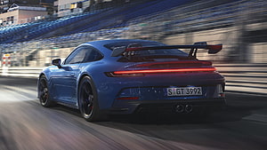 Blue Porsche 911 GT3 Cup Race Car Speeding on Track HD wallpaper