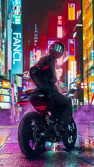 Neon-lit biker in full-face helmet on a black motorcycle in a rain-slicked cyberpunk city street at night HD phone wallpaper