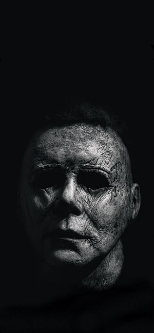 Michael Myers Halloween Horror Portrait in Dramatic Black and White Lighting HD phone wallpaper