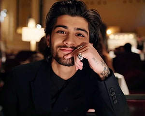 Zayn Malik in Black Suit with Ring and Hand Tattoo at an Event HD wallpaper