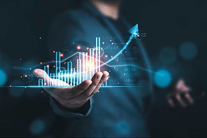 Business Growth and Financial Data Visualization Concept with Hand Holding Holographic Chart HD wallpaper