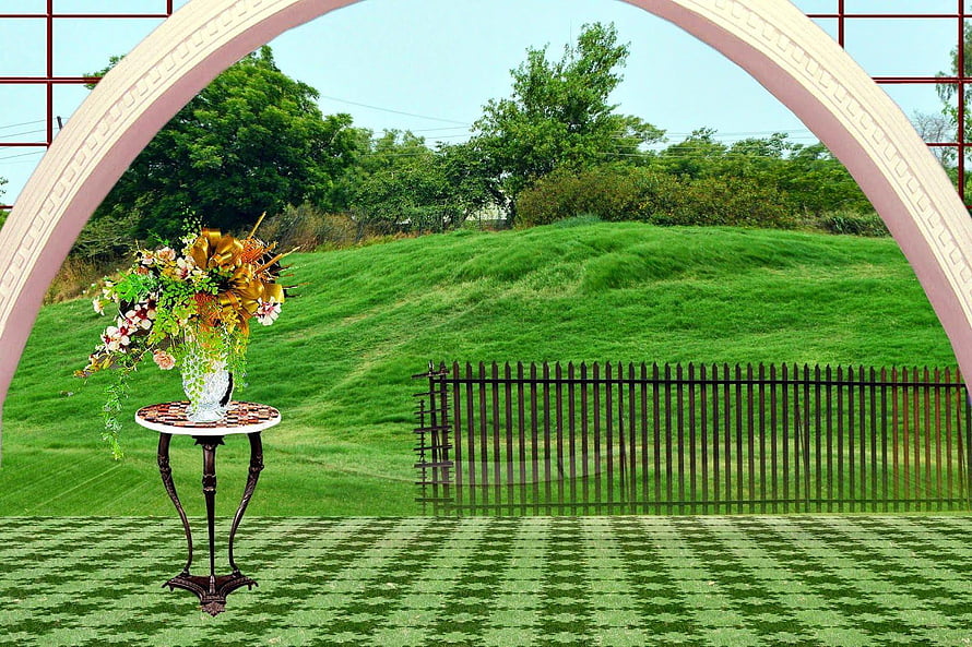 Elegant Garden Archway with Floral Arrangement and Mosaic Table HD wallpaper