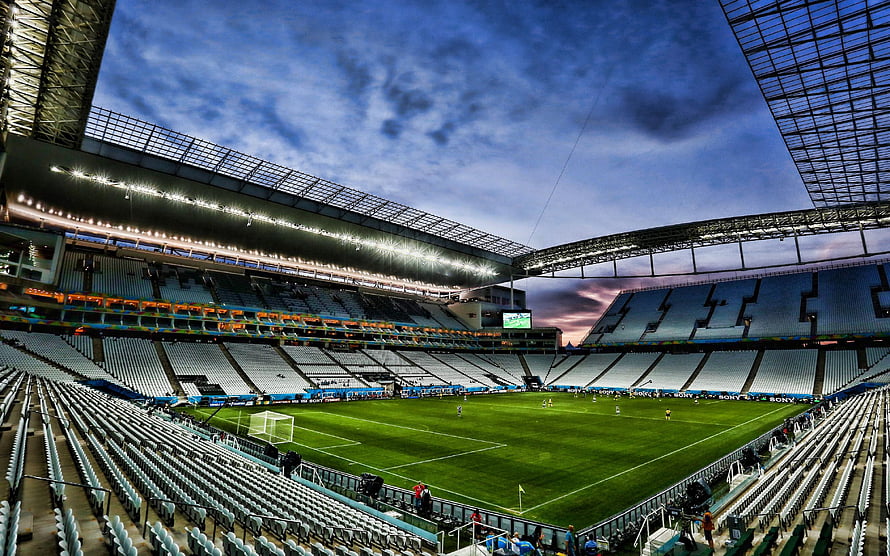 Arena Corinthians Stadium Interior at Dusk with Floodlights and Empty Seating HD wallpaper