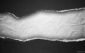 Torn Paper Texture on Dark Background with Crumpled Surface and Ragged Edges HD wallpaper