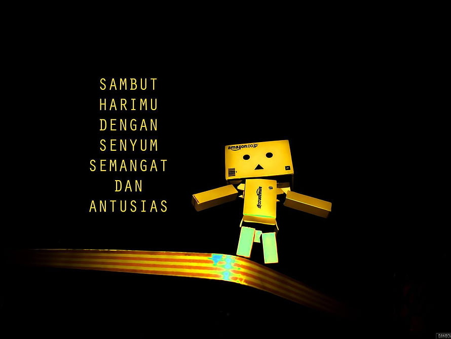 Danbo cardboard robot character standing on glowing golden ribbon against black background HD wallpaper