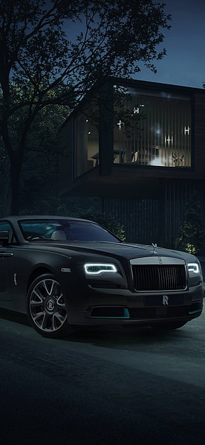 Matte Black Rolls-Royce Wraith Parked at Night in Front of Modern House HD phone wallpaper