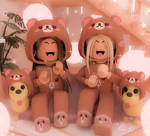 Cute Roblox avatars in matching brown bear hoodies with plush toys HD wallpaper