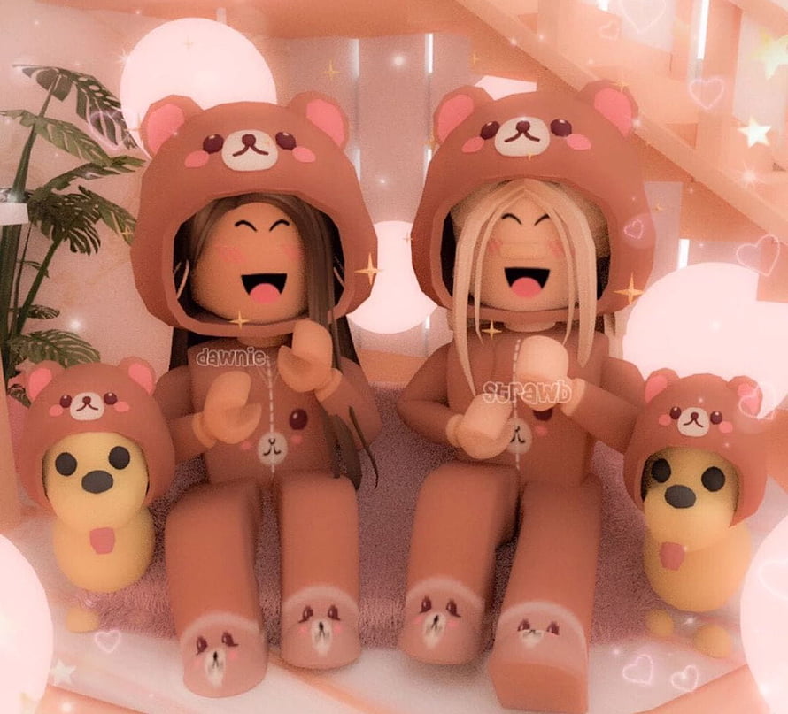 Cute Roblox avatars in matching brown bear hoodies with plush toys HD wallpaper