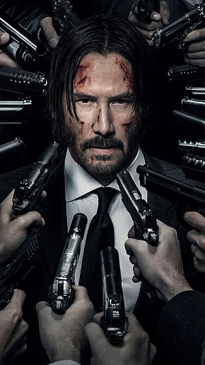 John Wick Surrounded by Guns in Dark Suit with Bloodied Face HD phone wallpaper