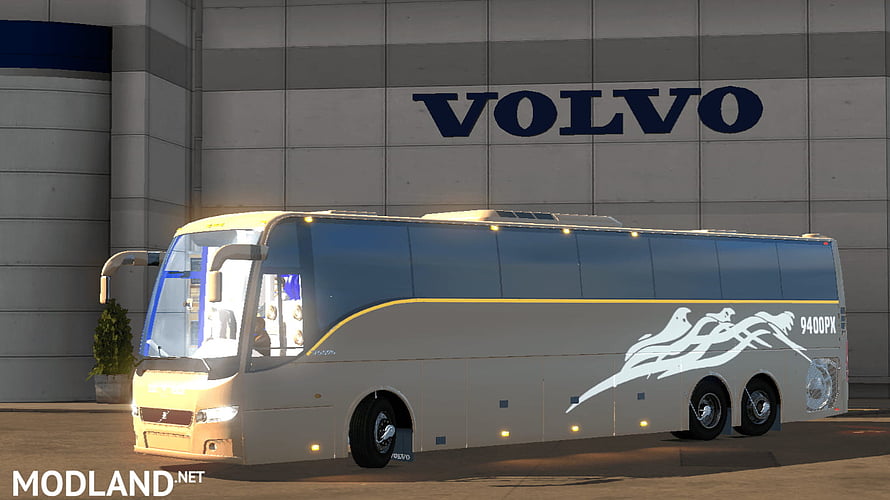 Volvo 9400PX Coach Bus Parked in Front of Brand Building HD wallpaper