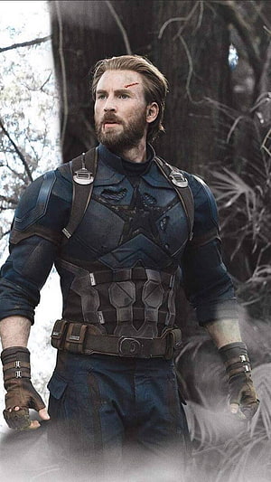 Bearded Captain America in Tactical Combat Suit Amidst Forest Mist HD phone wallpaper
