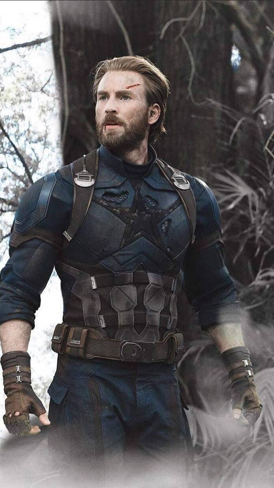Bearded Captain America in Tactical Combat Suit Amidst Forest Mist HD phone wallpaper