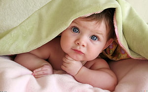 Adorable Baby Boy Peeking Out From Under A Soft Green Blanket HD wallpaper