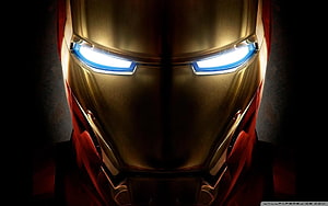 Iron Man Close-Up Portrait with Glowing Blue Eyes and Gold Armor, iron man, ironman HD wallpaper